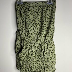 Green romper with flower design